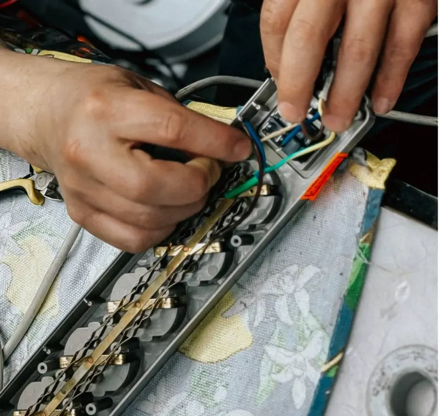 Electrician wiring a socket